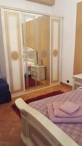 Postel nebo postele na pokoji v ubytování B&B in Arena L' Opera