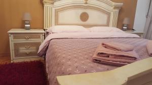 Postel nebo postele na pokoji v ubytování B&B in Arena L' Opera