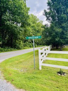 a street sign on the side of a road at Maggie Valley Cabin Rentals in Maggie Valley