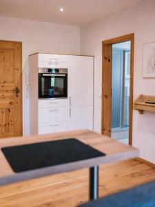 Kuchyň nebo kuchyňský kout v ubytování Landhaus Weber