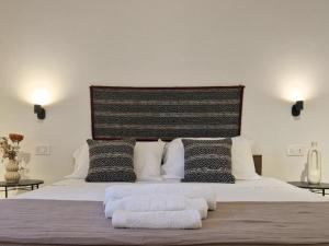 Postel nebo postele na pokoji v ubytování Via Sassari 177 Alghero + 1 fotografie