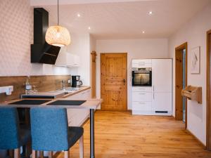 Kuchyň nebo kuchyňský kout v ubytování Landhaus Weber