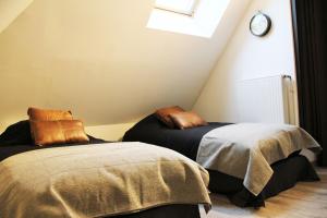 Tempat tidur dalam kamar di Villa Louis Victor