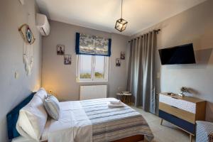 Postel nebo postele na pokoji v ubytování Country House Crete