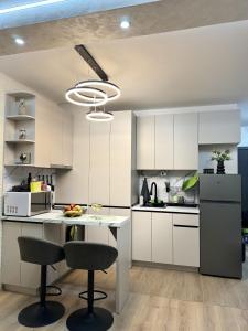 Η κουζίνα ή μικρή κουζίνα στο MG Homes