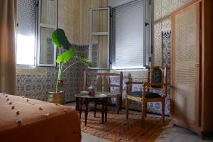 A seating area at chez Aissam