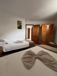 Ένα ή περισσότερα κρεβάτια σε δωμάτιο στο Bungalow Sol +14 φωτογραφίες