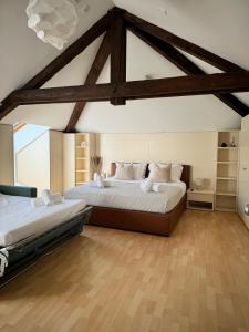 Postel nebo postele na pokoji v ubytování Hotel Locanda Castagnola