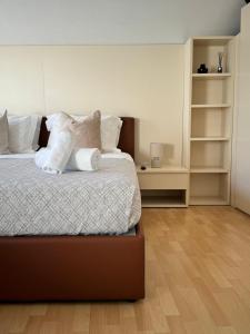 Postel nebo postele na pokoji v ubytování Hotel Locanda Castagnola