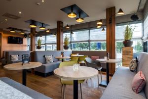 Posezení v ubytování Holiday Inn Eindhoven Centre by IHG