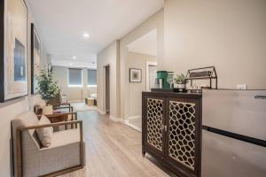 a living room with a couch and a table at Private Room with Kitchen & Bath 3 in Bradenton