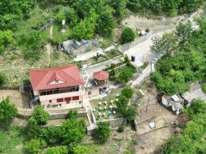an overhead view of a house with a red roof at Vila Zeni Zoto, Private Room featuring panoramic views from Terrace and Balcony in Çorovodë +9 photos