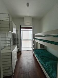 Katil atau katil-katil dalam bilik di dangio129 APARTMENT