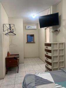 TV a/nebo společenská místnost v ubytování Habitaciones amobladas - Manabí suites
