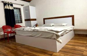 Fotografie z fotogalerie ubytování Hotel O White pearl Resort v destinaci Chik Bānavar