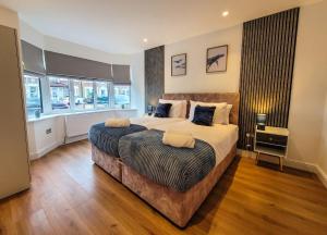 Foto Londonis asuva majutusasutuse 4 bed 2 bath Spacious House with 2 Driveway parking in Ilford London galeriist