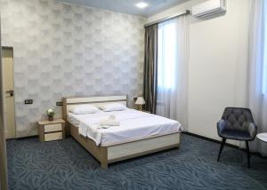 Voodi või voodid majutusasutuse A E K A Hotel toas