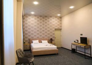 Postel nebo postele na pokoji v ubytování A E K A Hotel + 15 fotografií