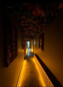 a hallway with a light at the end of a hallway at Edwin PLUS in Istanbul