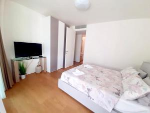 Giường trong phòng chung tại Luxury apartment pool, Spa, gym +25 ảnh