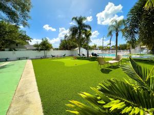 2q Beds Studio Apt With Shared Pool 08にある庭
