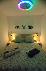 En eller flere senge i et værelse på Beach Home San Agustín + 20 billeder