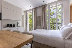 Cuisine ou kitchenette dans l'établissement Quartier Libre Marais