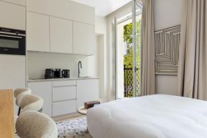 Cuisine ou kitchenette dans l'établissement Quartier Libre Marais