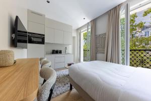 Cuisine ou kitchenette dans l'établissement Quartier Libre Marais