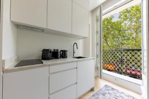 Cuisine ou kitchenette dans l'établissement Quartier Libre Marais