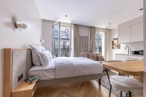 Cuisine ou kitchenette dans l'établissement Quartier Libre Marais