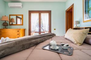 Кровать или кровати в номере Villa Rosa sul mare