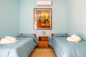 Кровать или кровати в номере Villa Rosa sul mare