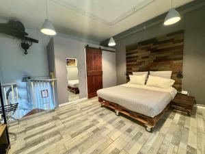 Giường trong phòng chung tại La Cornice - Nel cuore di Napoli