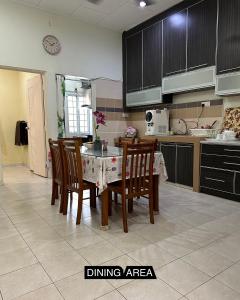 Kuchyň nebo kuchyňský kout v ubytování Tamu House Botani