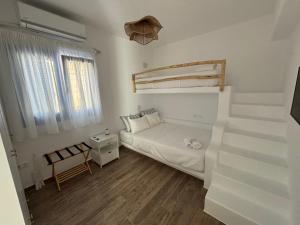 Postel nebo postele na pokoji v ubytování Paros Relux