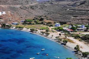 an aerial view of a beach with boats in the water at AJ studios by the Sea in Kithnos