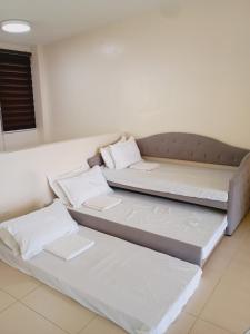 Ένα ή περισσότερα κρεβάτια σε δωμάτιο στο The Loft Pico de Loro