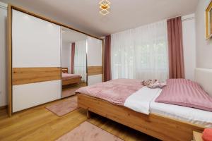 Postel nebo postele na pokoji v ubytování Apartments Iva