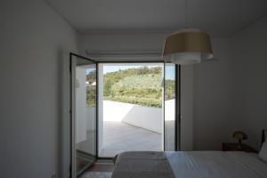 Ένα ή περισσότερα κρεβάτια σε δωμάτιο στο Golden House