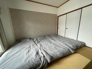 Voodi või voodid majutusasutuse Maison Myoken toas
