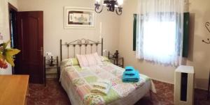 Cama o camas de una habitación en Casa Pilar