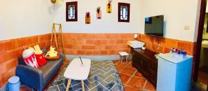 Area soggiorno di Red Tomato B&B