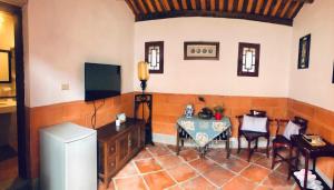 TV o dispositivi per l'intrattenimento presso Red Tomato B&B