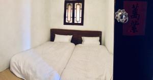 Letto o letti in una camera di Red Tomato B&B