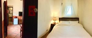 Letto o letti in una camera di Red Tomato B&B