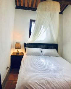 Letto o letti in una camera di Red Tomato B&B
