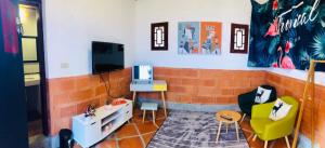 TV o dispositivi per l'intrattenimento presso Red Tomato B&B
