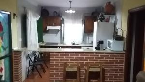 Una cocina o zona de cocina en Casa Pilar