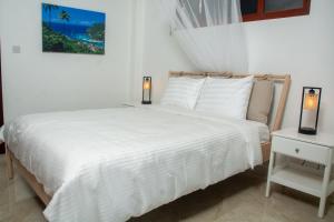 Postel nebo postele na pokoji v ubytování Villa Vino Lucia + 37 fotografií